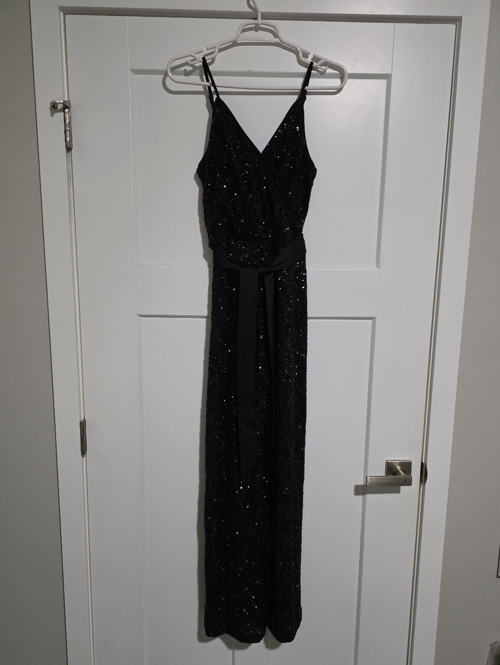 NWT Express Black Sequin Jumpsuit with Waist Sash. Size XS.